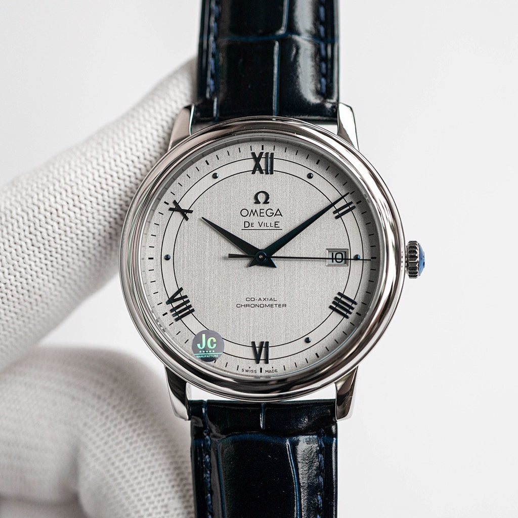 Omega De Ville wristwatch with blue leather strap and silver dial, Roman numerals