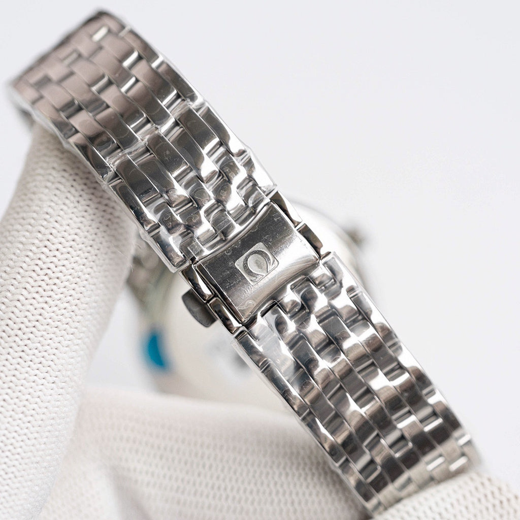 Omega De Ville stainless steel bracelet wristwatch with polished metal link bracelet