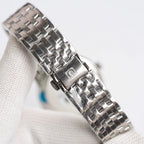 Omega De Ville stainless steel bracelet wristwatch with polished metal link bracelet