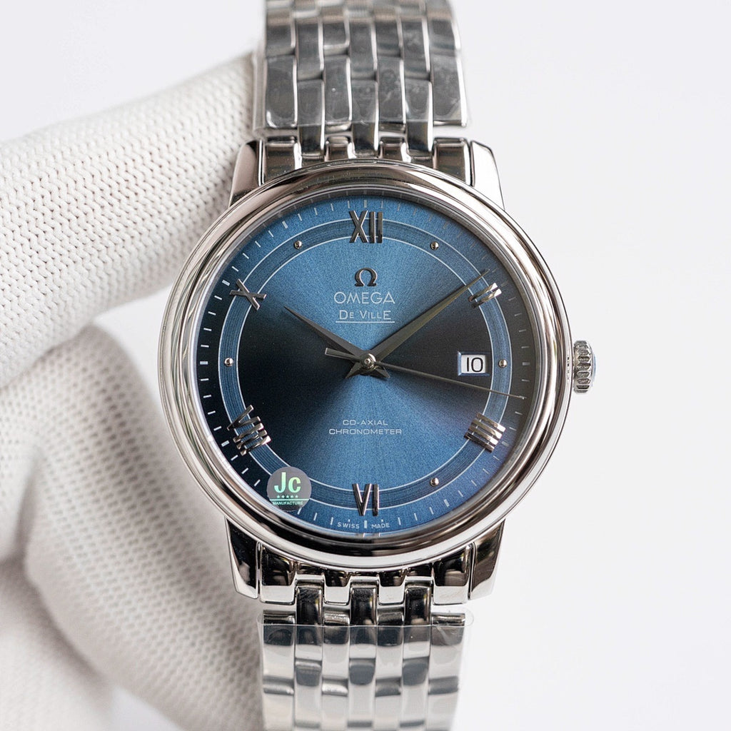 Omega De Ville wristwatch with steel bracelet and blue dial, Roman numerals and date window