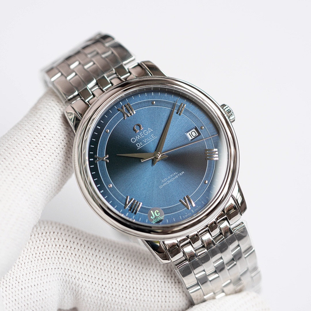 Omega De Ville wristwatch with steel bracelet, blue dial and silver bezel with crown on side