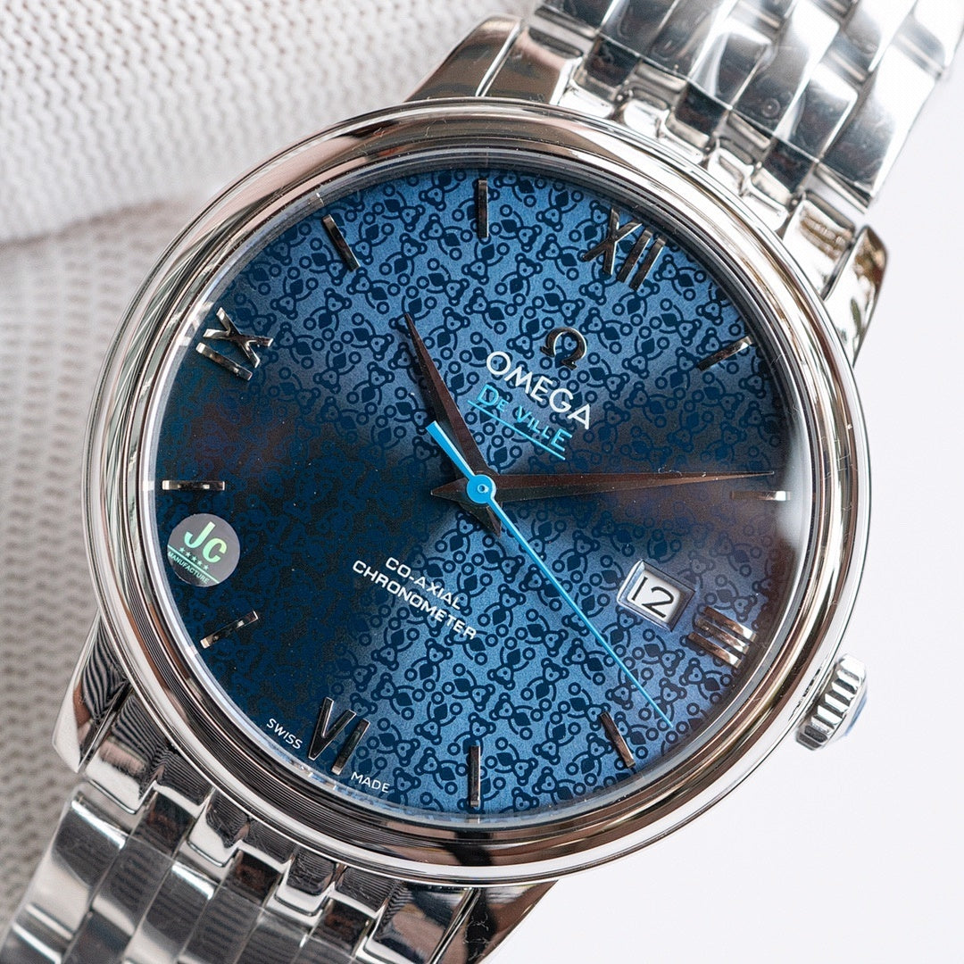 Omega watch with blue patterned dial and silver metal bracelet, date window