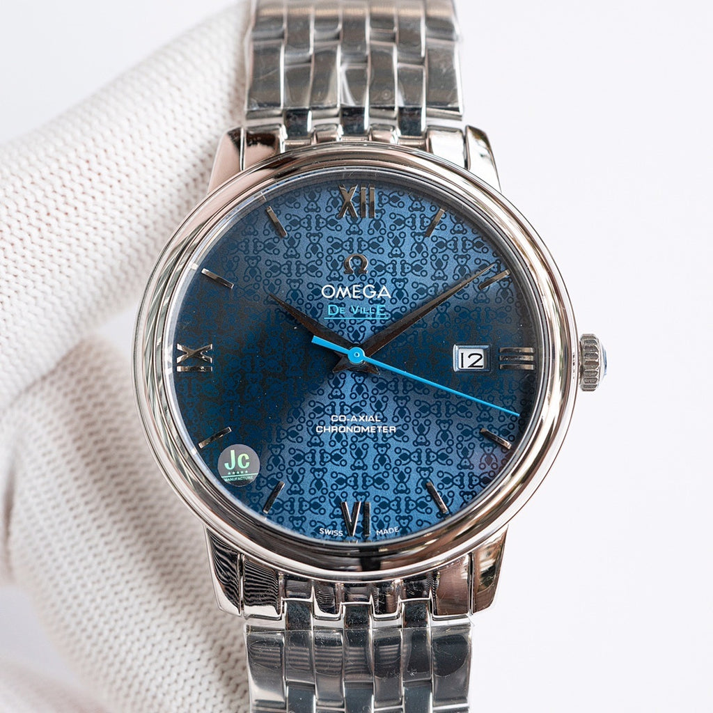 Omega watch with blue patterned dial and silver metal bracelet, roman numerals