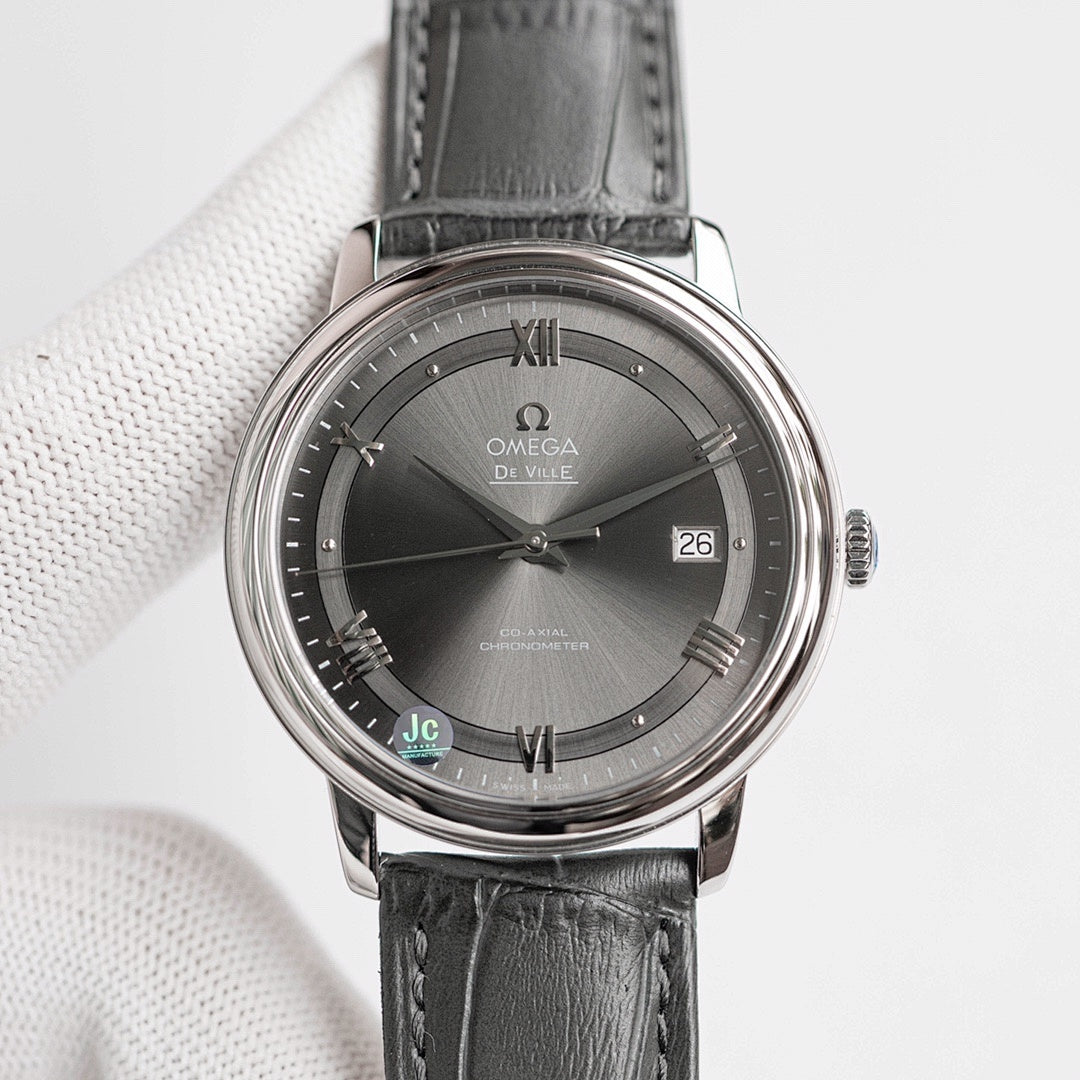 Omega De Ville wristwatch with black leather strap, dark dial, date 26.
