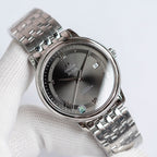 Omega De Ville wristwatch with steel bracelet and dark dial, Roman numerals.
