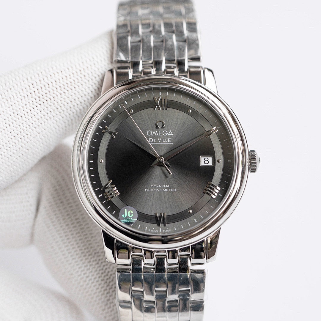 Omega De Ville wristwatch with steel bracelet, dark dial, date window.