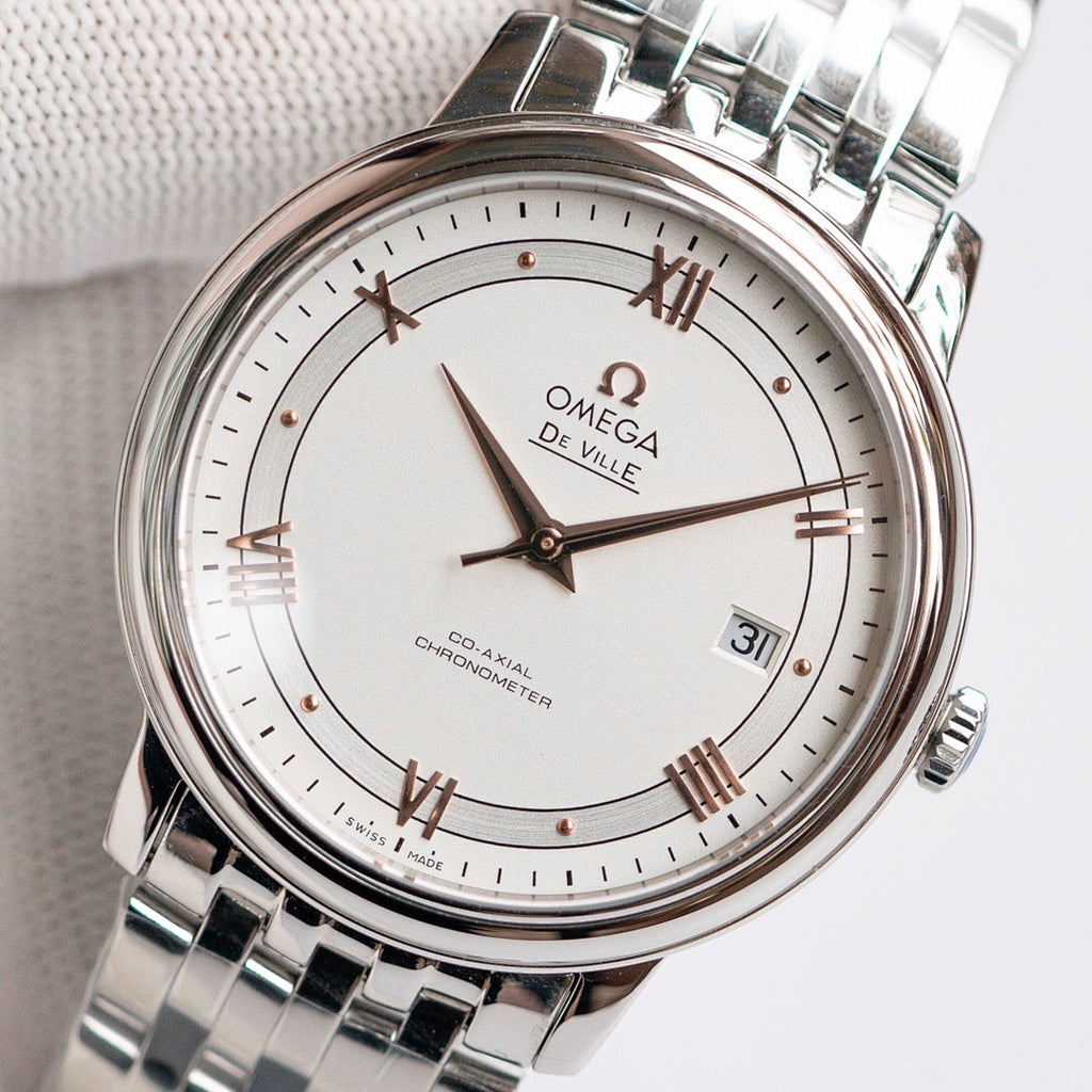 Omega De Ville wristwatch with stainless-steel bracelet, white dial, date at 31