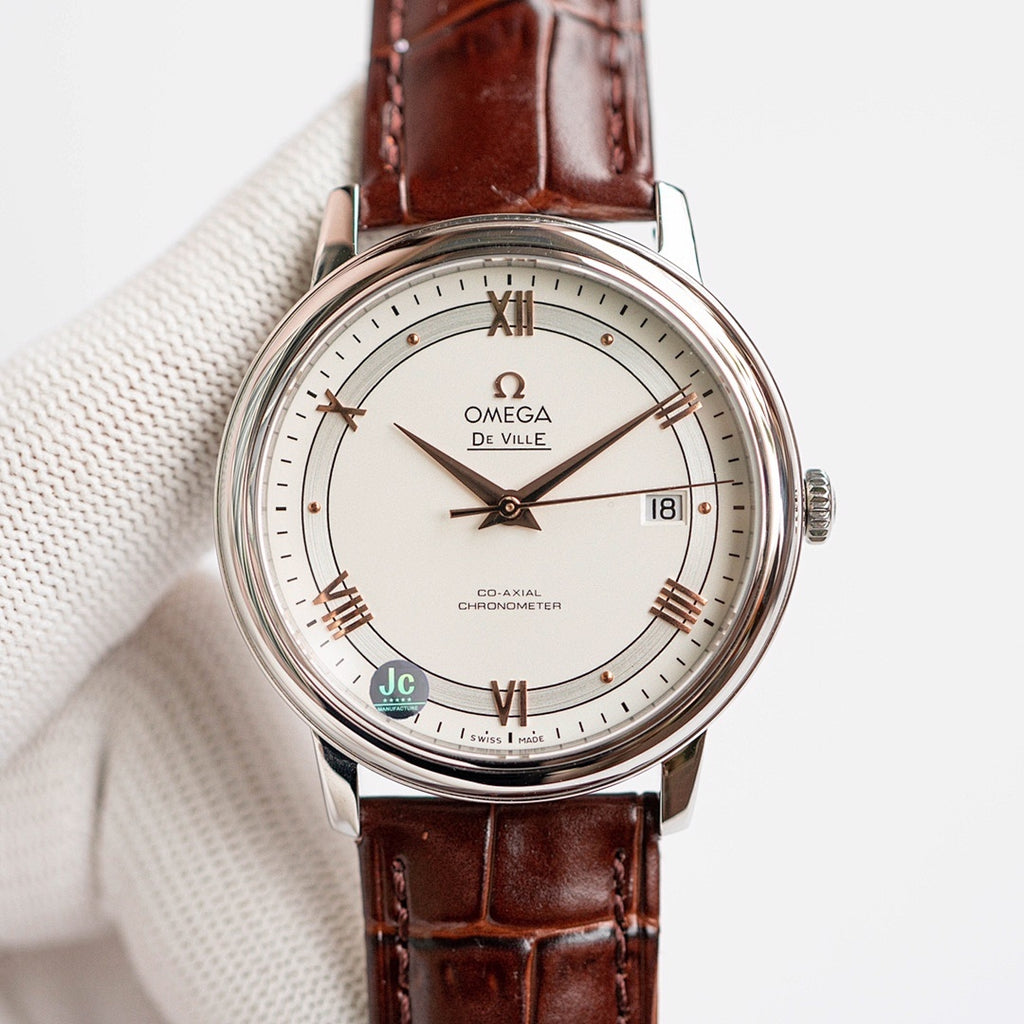 Omega De Ville wristwatch on brown leather strap, silver case, white dial, date at 18