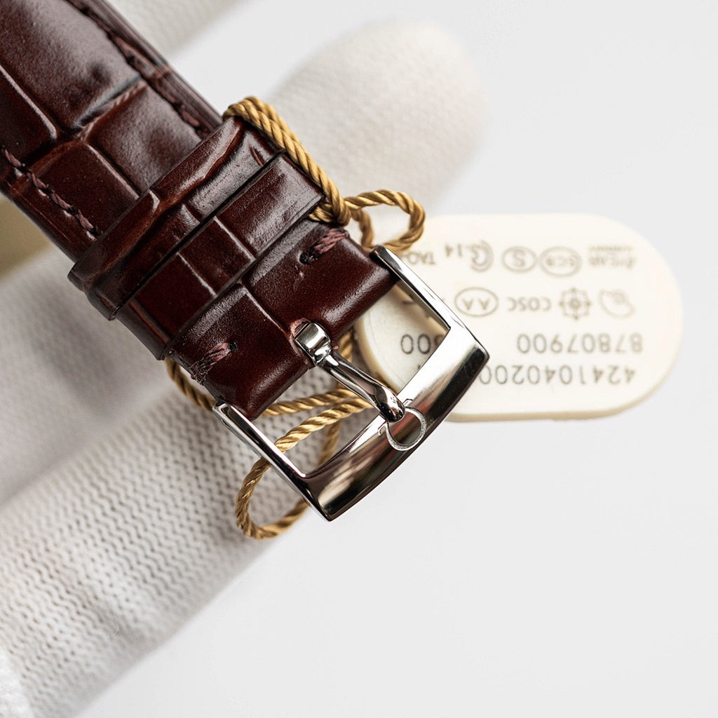 Omega De Ville watch clasp with brown leather strap, silver buckle and knotted keeper