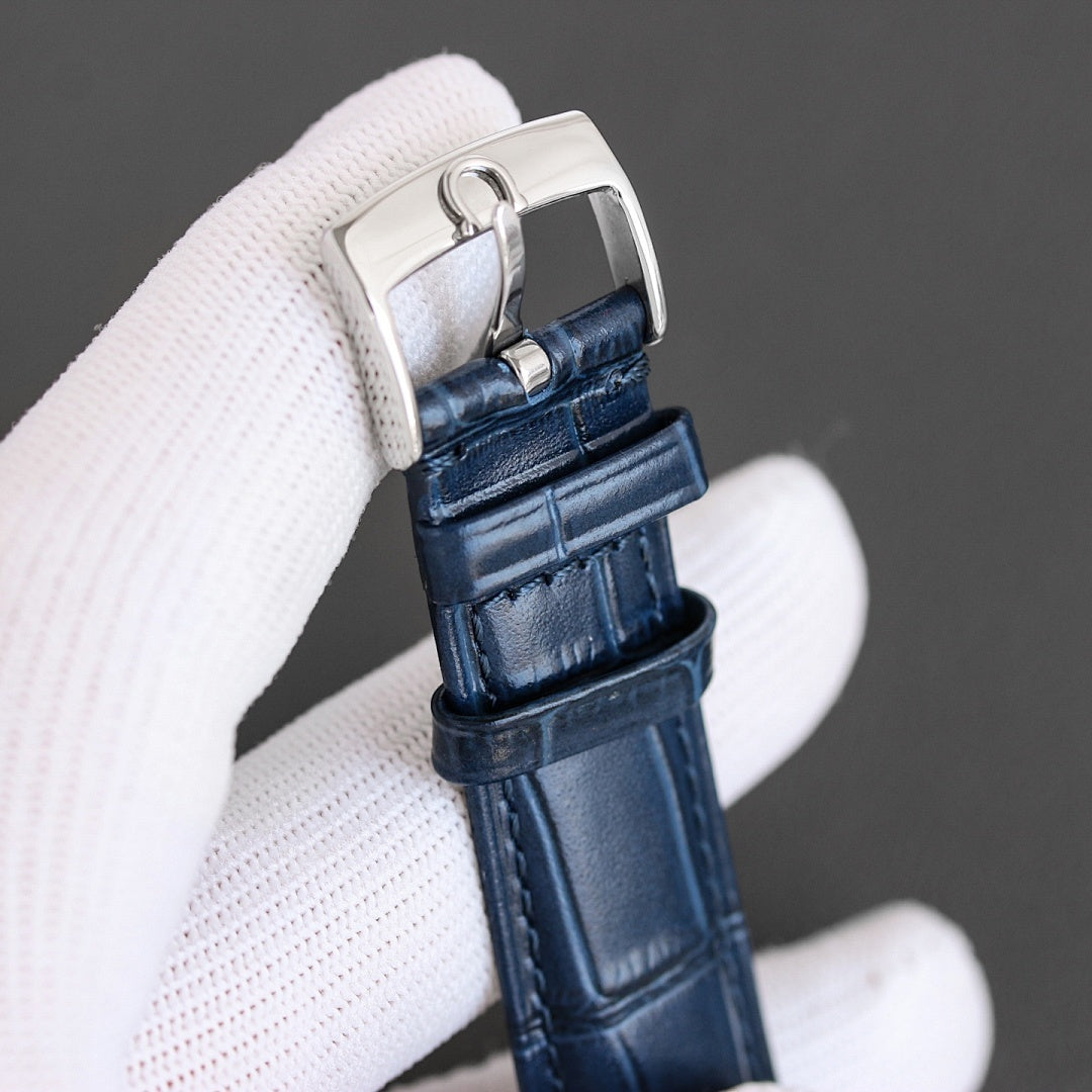 Omega watch with blue leather strap and silver-toned buckle clasp