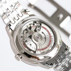 Stainless steel automatic watch caseback with visible mechanical movement