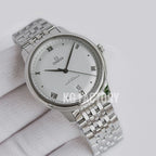 Stainless steel wristwatch with light gray dial, Roman numerals, date window