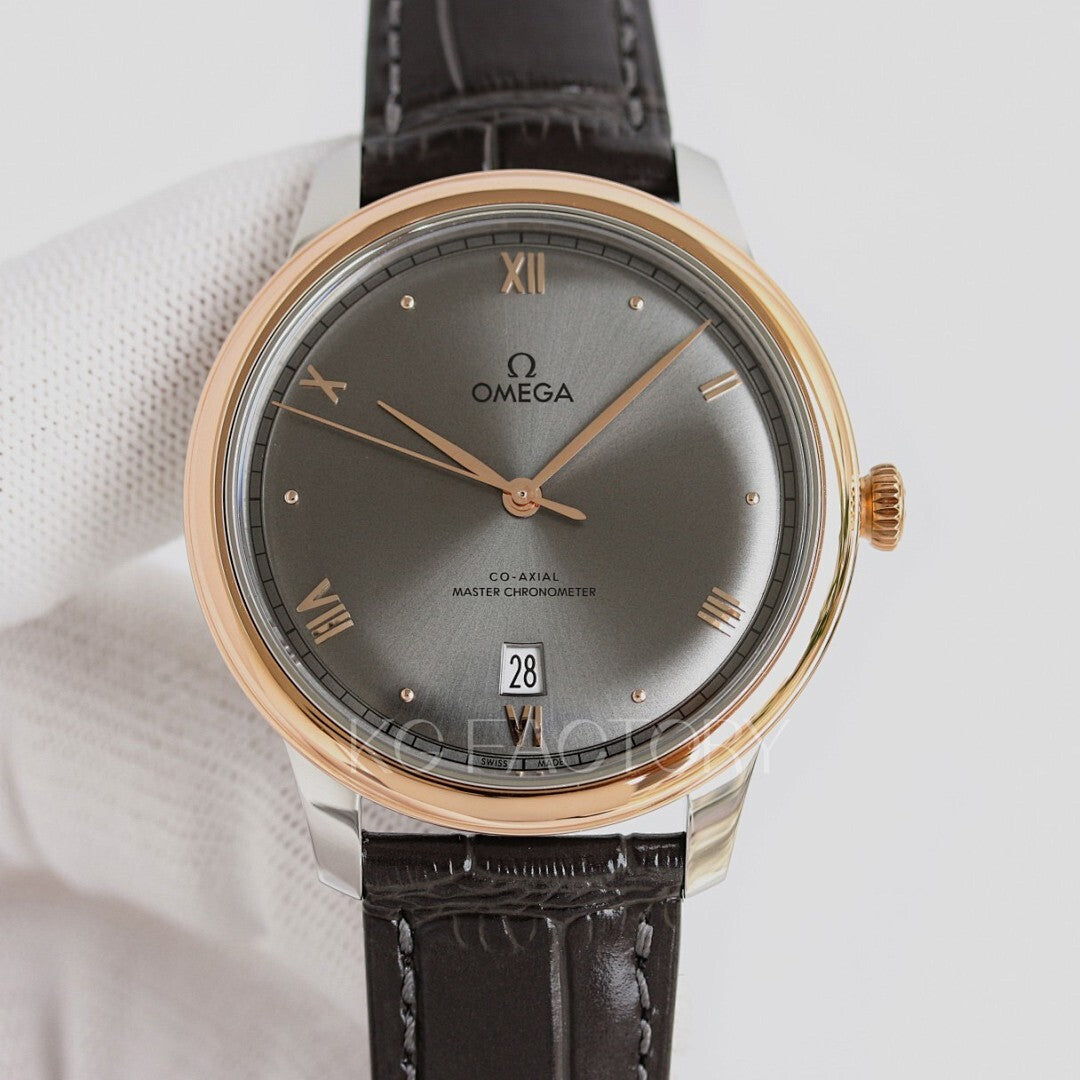 Analog wristwatch, dark gray dial, gold-tone case, black leather strap, day-date window