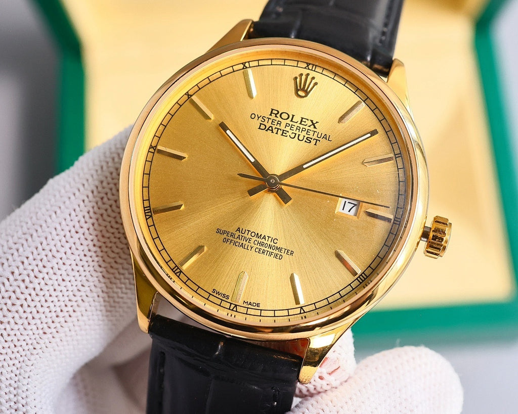 Omega wristwatch with gold dial and black leather strap, gold-tone bezel and date window