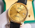 Omega wristwatch with gold dial and black leather strap, gold-tone bezel and date window