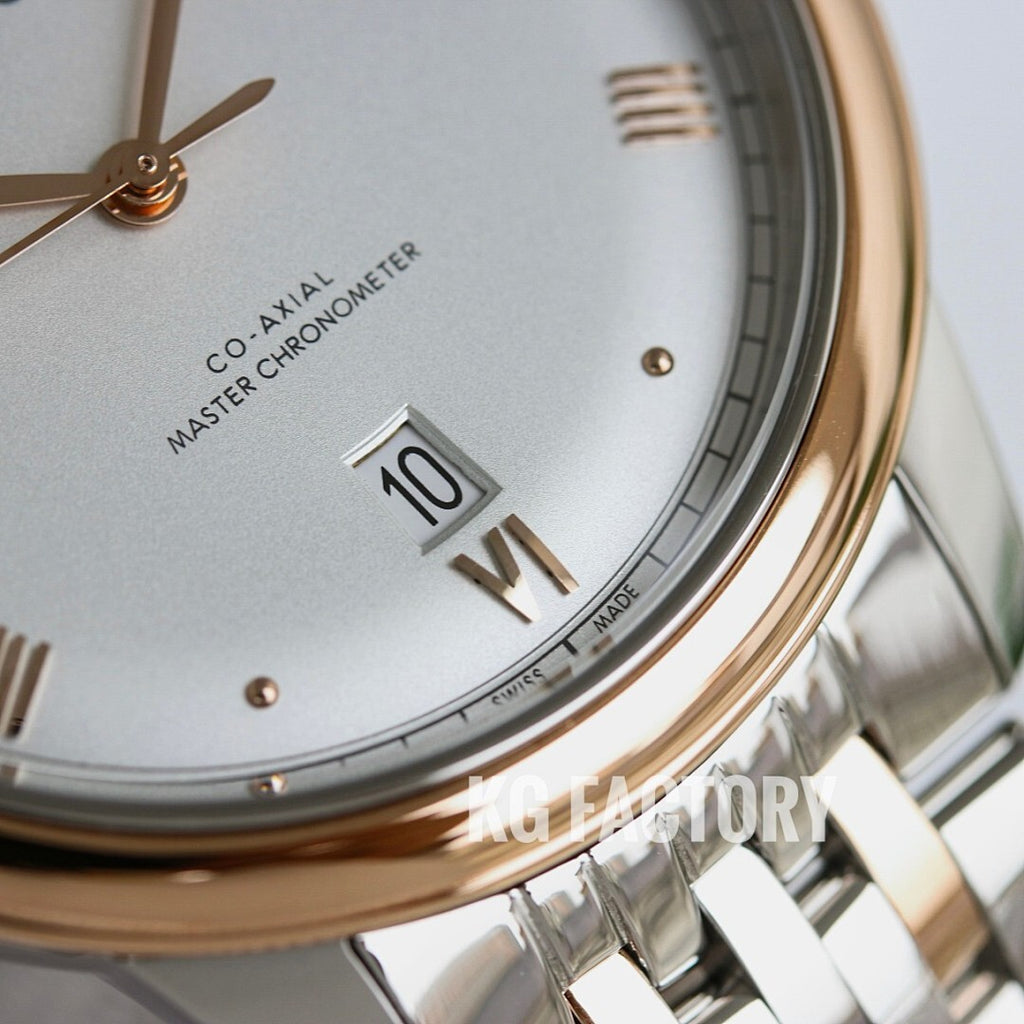 Omega wristwatch close-up of dial numerals and gold-rim bezel on bracelet