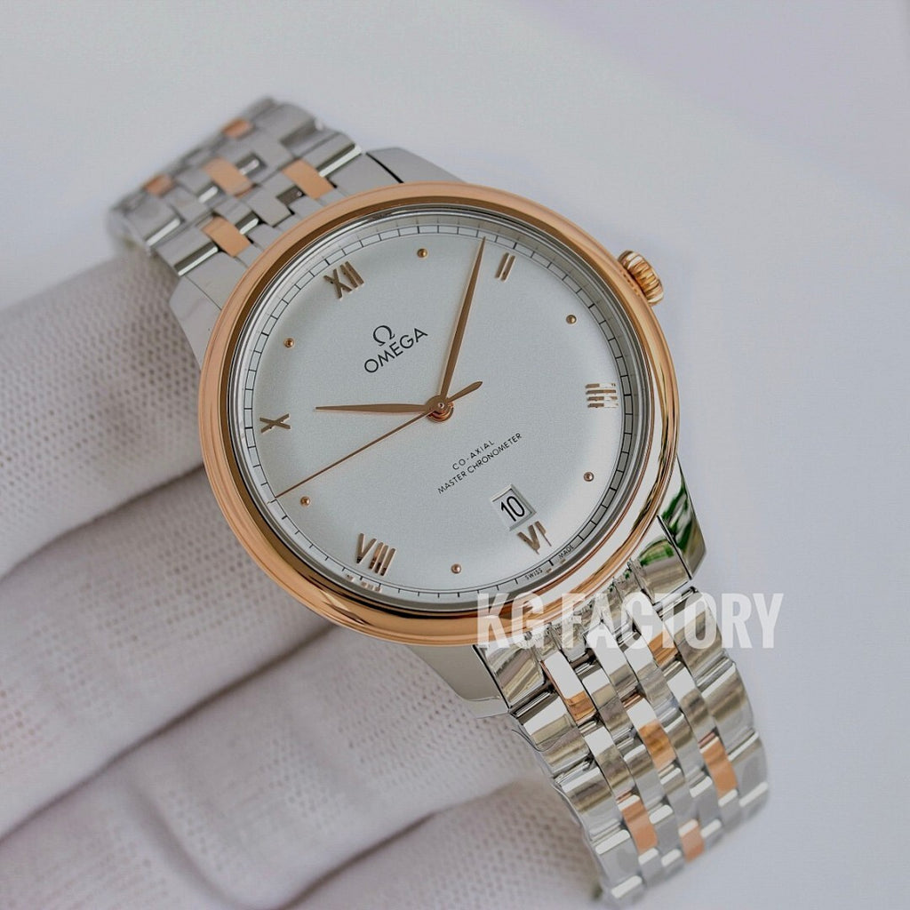 Omega wristwatch with white dial, gold bezel, and silver link bracelet