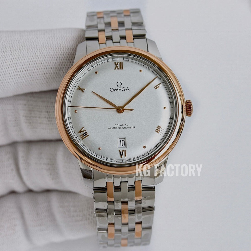 Omega wristwatch with white dial, gold bezel accents, and silver link bracelet