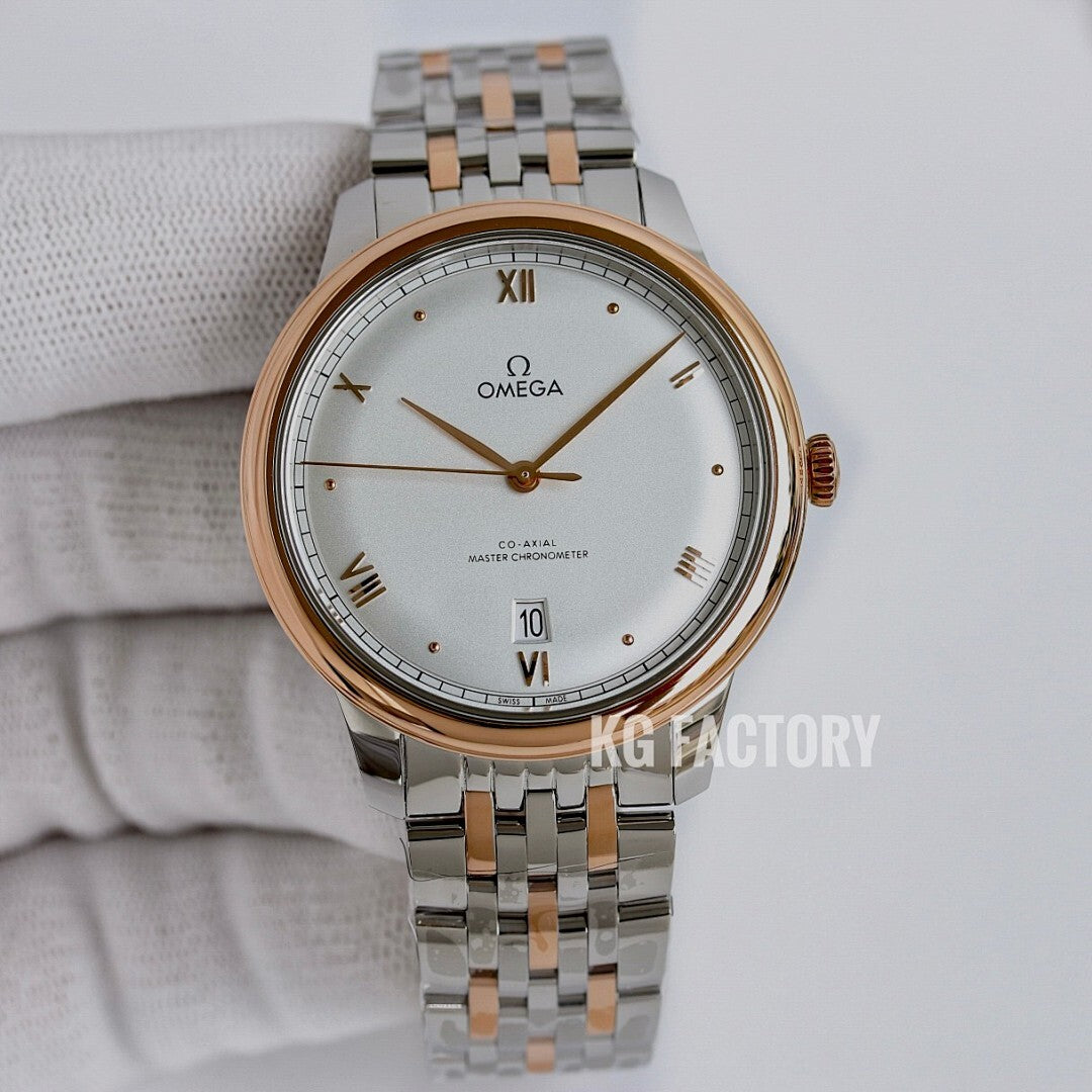 Omega wristwatch with white dial, gold bezel accents, and silver link bracelet