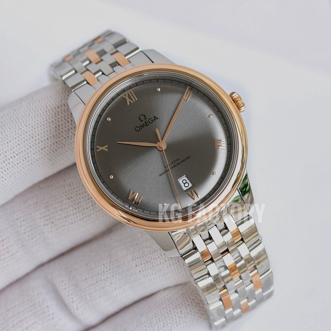 Omega wristwatch with dark gray dial, gold bezel, and silver link bracelet