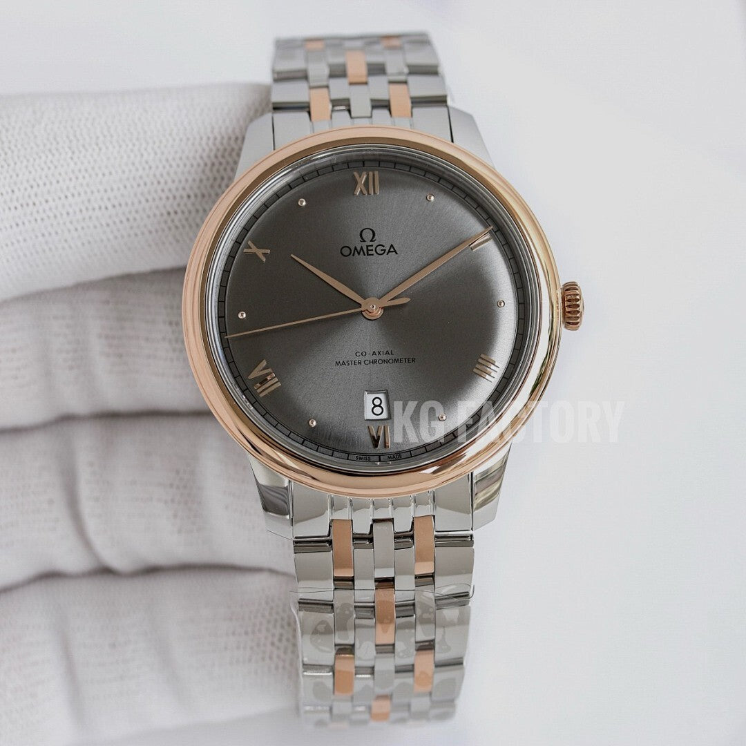 Omega wristwatch with dark gray dial, gold bezel, and silver link bracelet