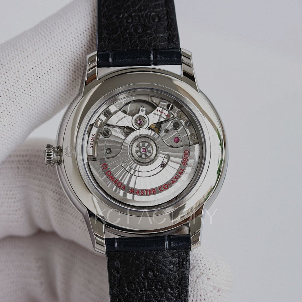 Omega watch case back with visible mechanical movement and black leather strap.
