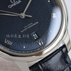Omega watch close-up: dark blue dial with date window and Roman numerals.