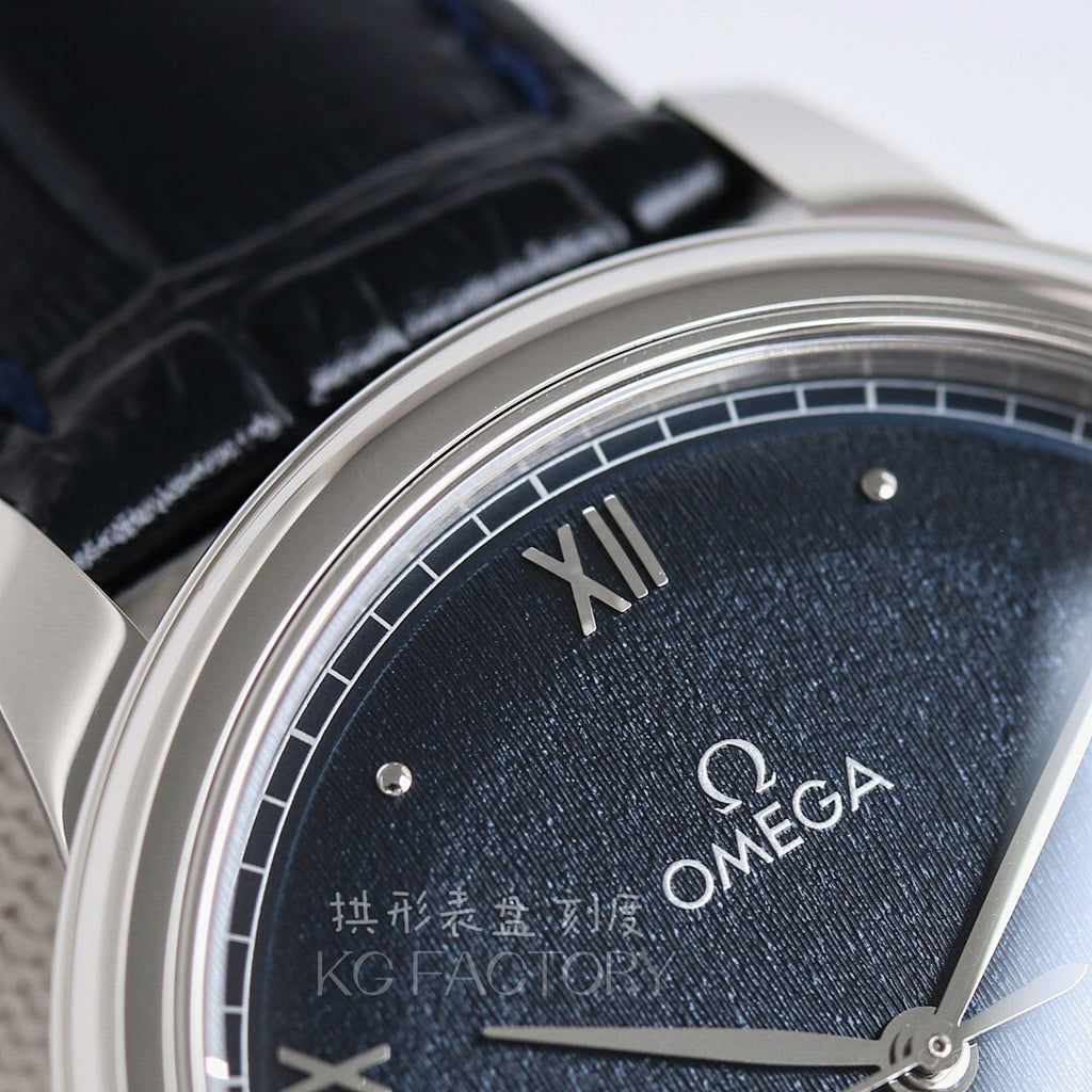 Omega watch close-up: dark blue dial with Roman numerals and Omega logo.