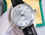 Round Omega wristwatch with silver dial, black leather strap, polished metal bezel.