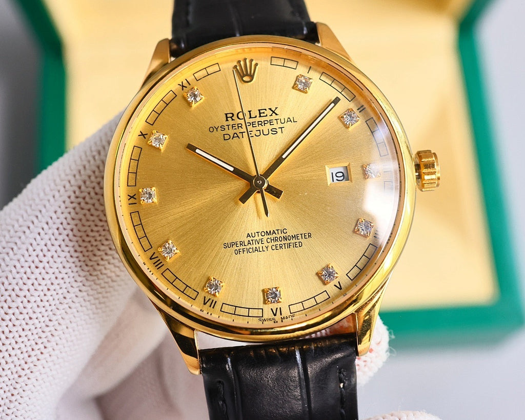 Gold-tone wristwatch with black leather strap, gold dial, Roman numerals and date at 19