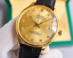 Gold-tone wristwatch with black leather strap, gold dial and Roman numerals, date window