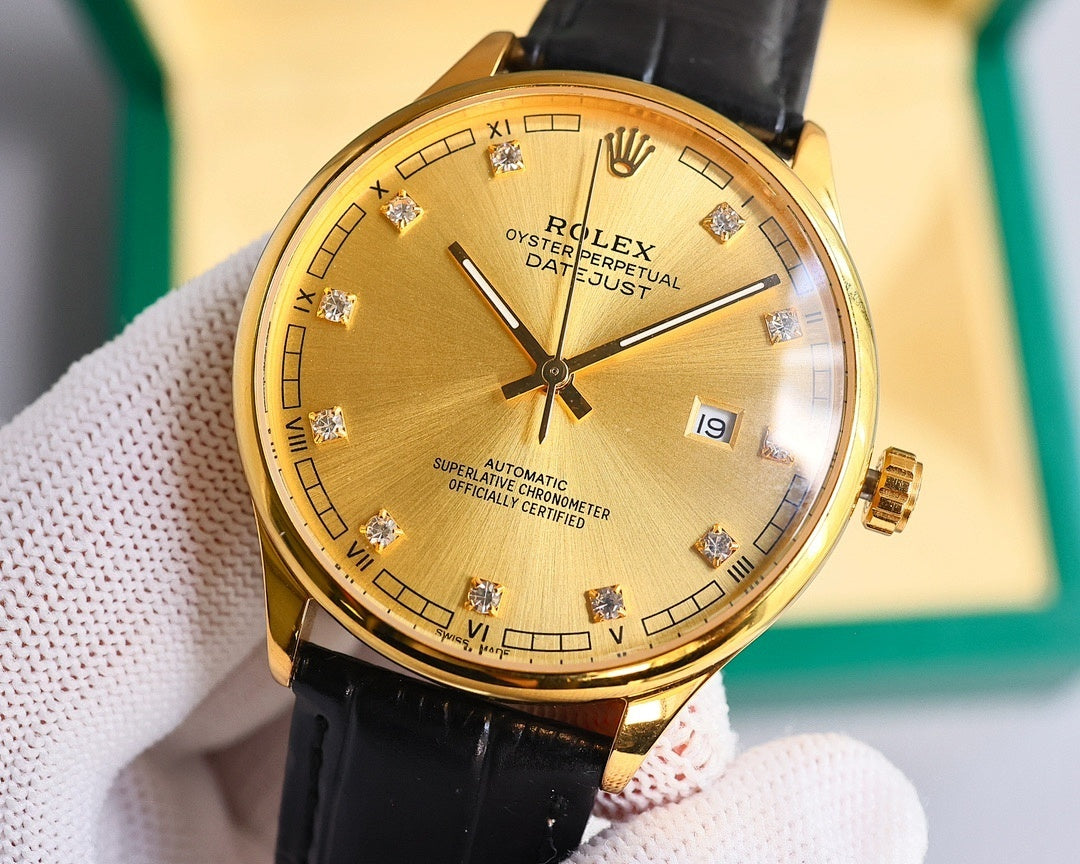Gold-tone wristwatch with black leather strap, gold dial and Roman numerals, date window