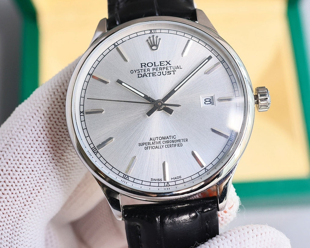 Omega watch with silver-tone case, white dial, black leather strap, front view