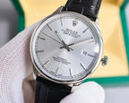 Omega watch with silver-tone case, white dial, black leather strap, three-quarter view