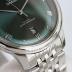 Omega wristwatch close-up of dark green dial, Roman markers, and steel bezel