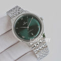 Omega wristwatch with dark green dial and stainless steel link bracelet