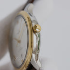 Omega watch side profile with gold tone crown and polished case, brown leather strap.