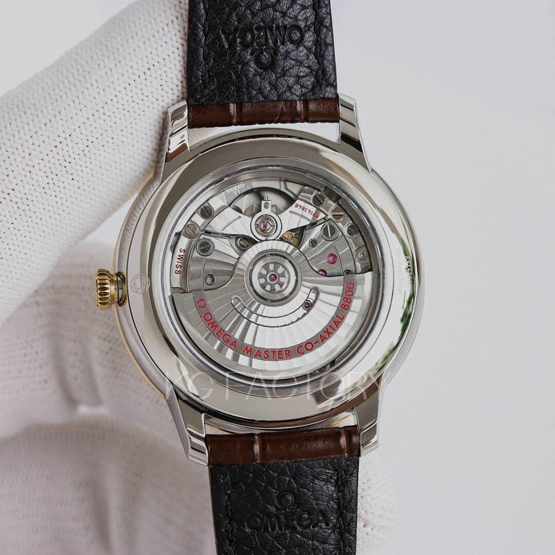 Omega watch stainless steel caseback with mechanical movement, black leather strap.