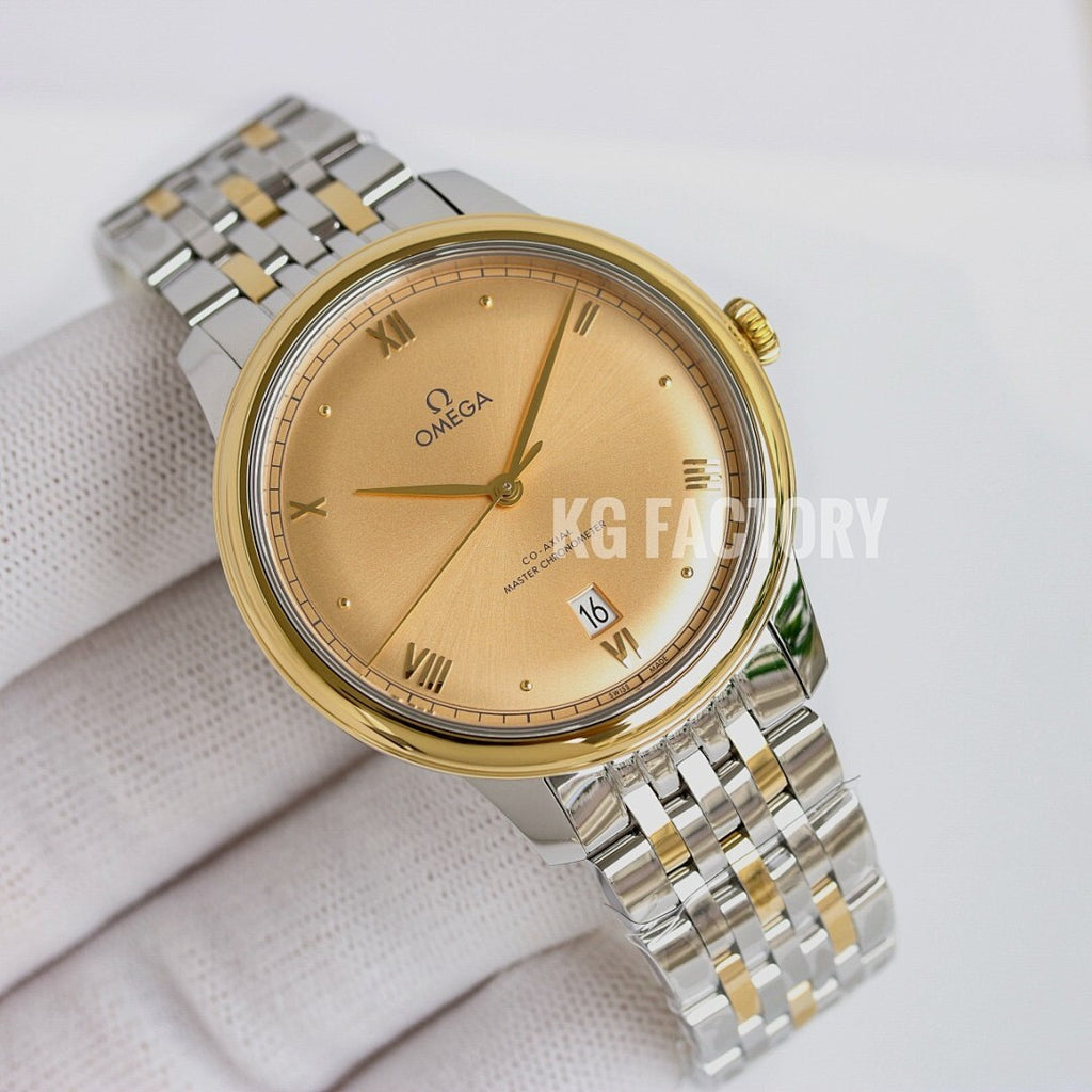 Two-tone wristwatch with gold-tone bezel, champagne dial, and metal link bracelet
