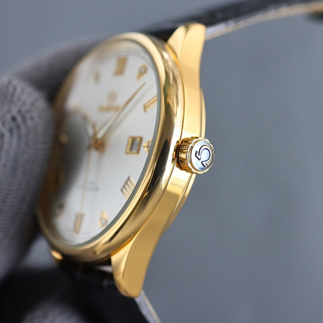 Gold Omega watch crown on dark leather strap