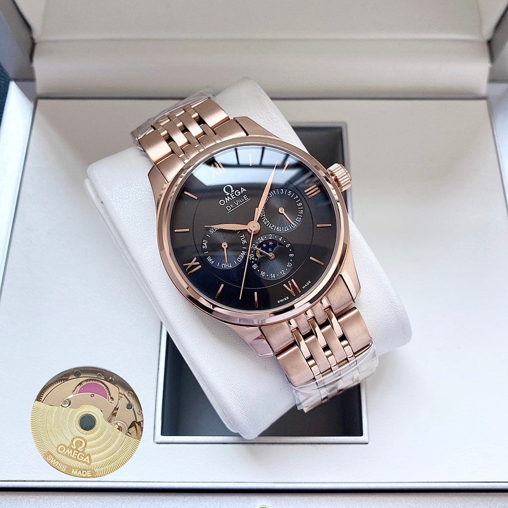 Omega watch with rose-gold metal bracelet and dark blue dial in white presentation box.