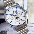 Omega watch with silver metal bracelet and white dial, blue accents and subdials