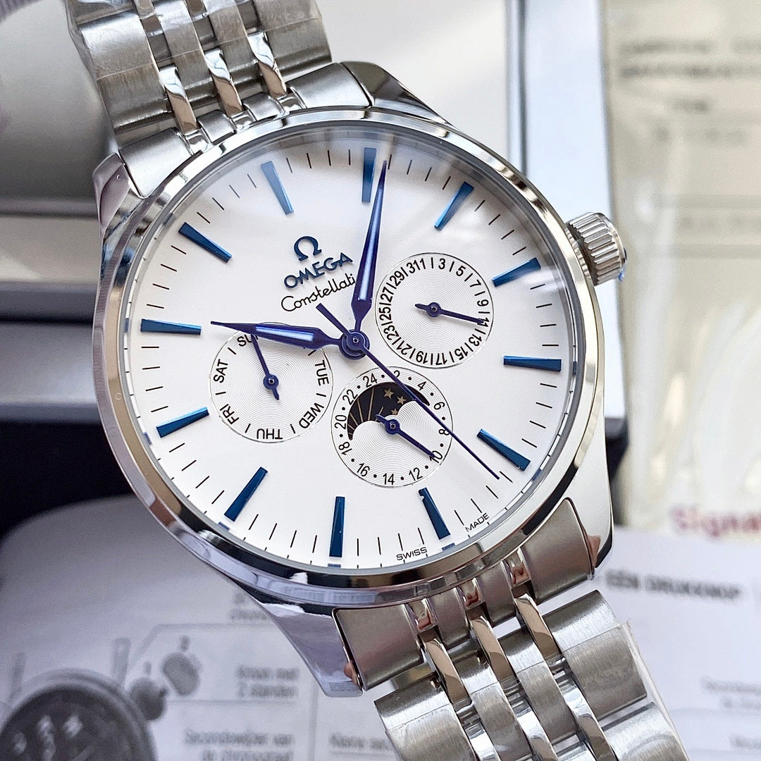 Omega watch with silver metal bracelet and white dial, blue accents and subdials