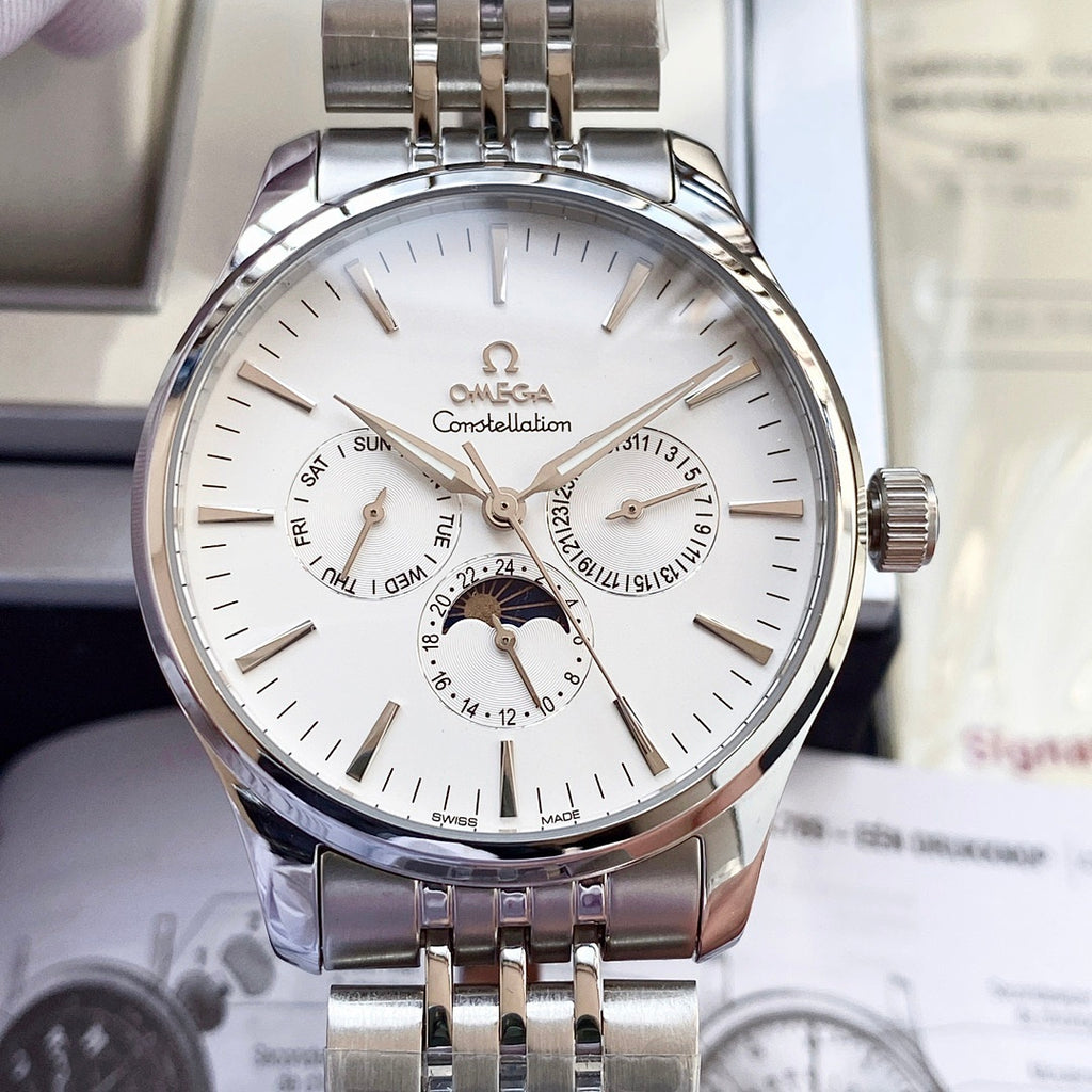 Omega watch with silver metal bracelet and white dial, multiple subdials shown