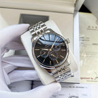 Omega watch with silver metal bracelet and dark blue dial, multiple subdials