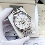 Omega watch with silver metal bracelet and white dial, visible subdials