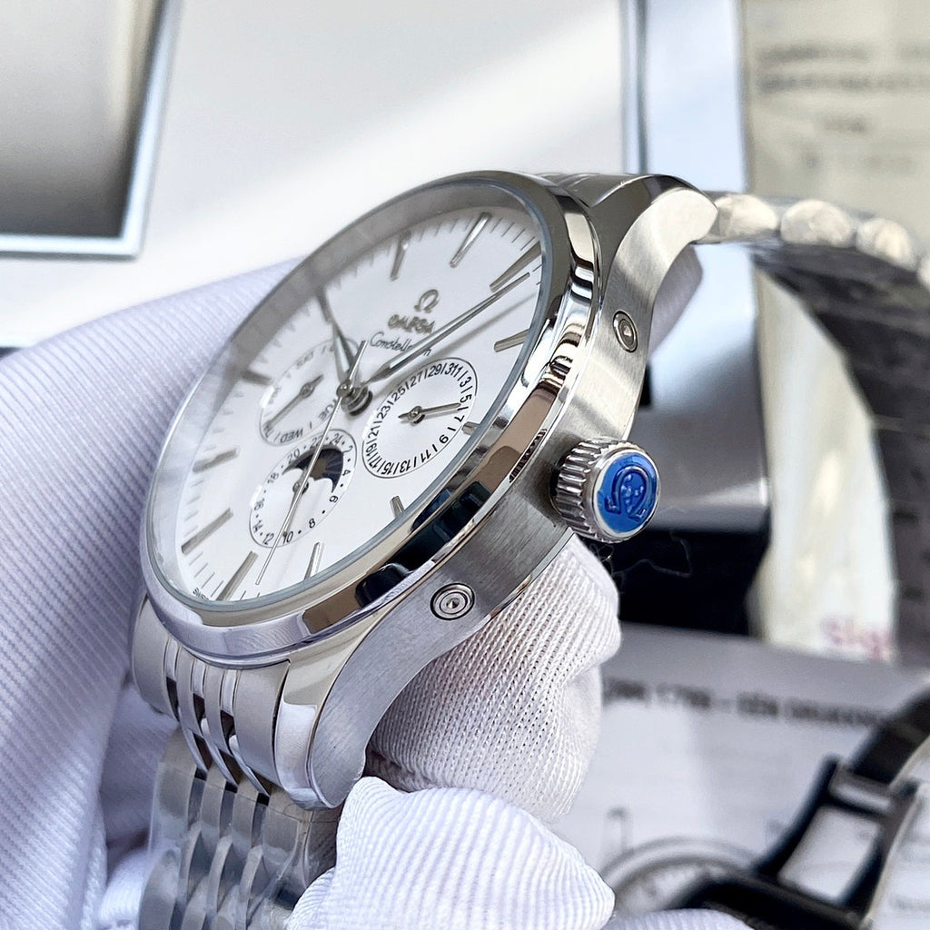 Omega watch with silver case and bracelet, white dial with subdials