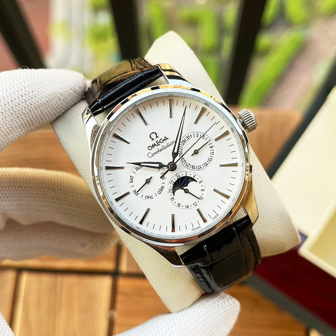Omega watch with white dial, black leather strap, gold-tone case and subdials