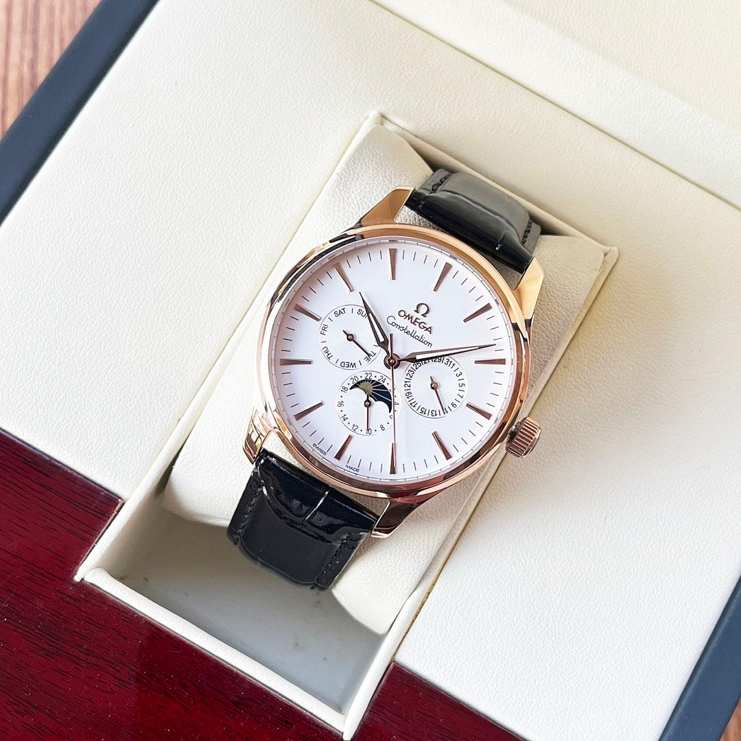 Omega watch with white dial, black leather strap, rose-gold tone case and subdials