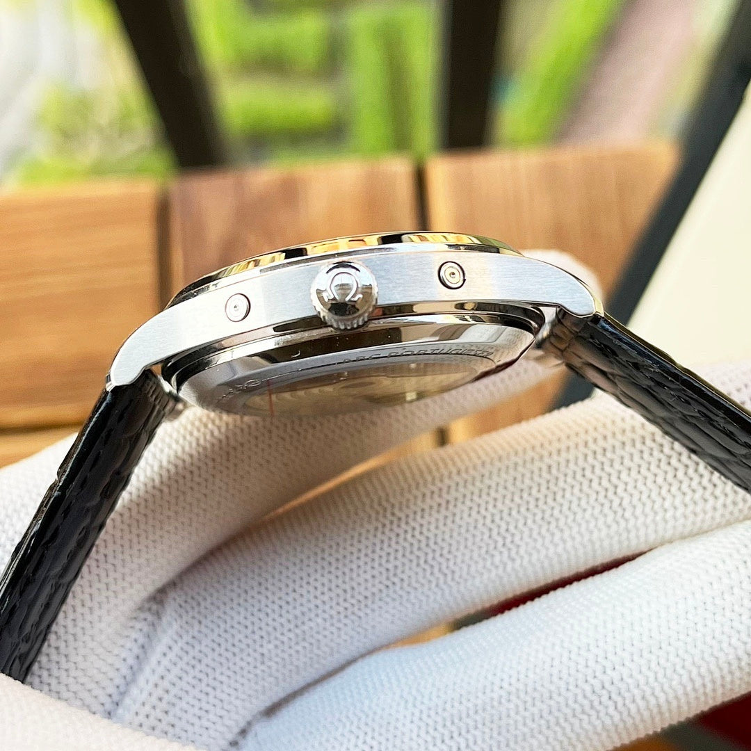 Omega watch side view with black leather strap, metal case and crown detail visible